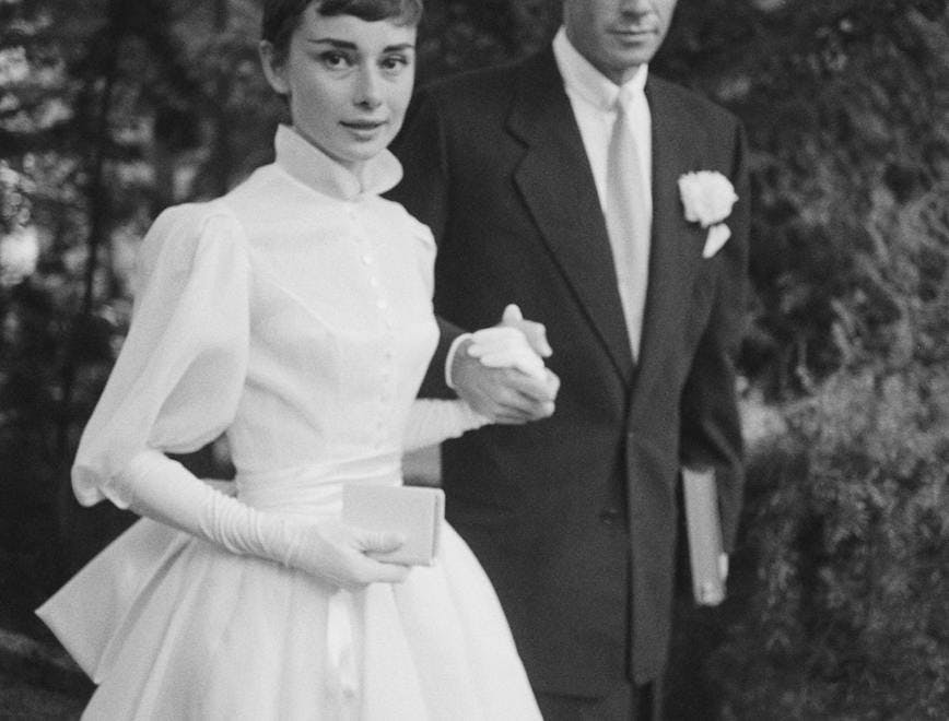 black & white,format portrait,male,female,film,film actor,film a clothing suit overcoat person robe fashion gown tuxedo wedding bride