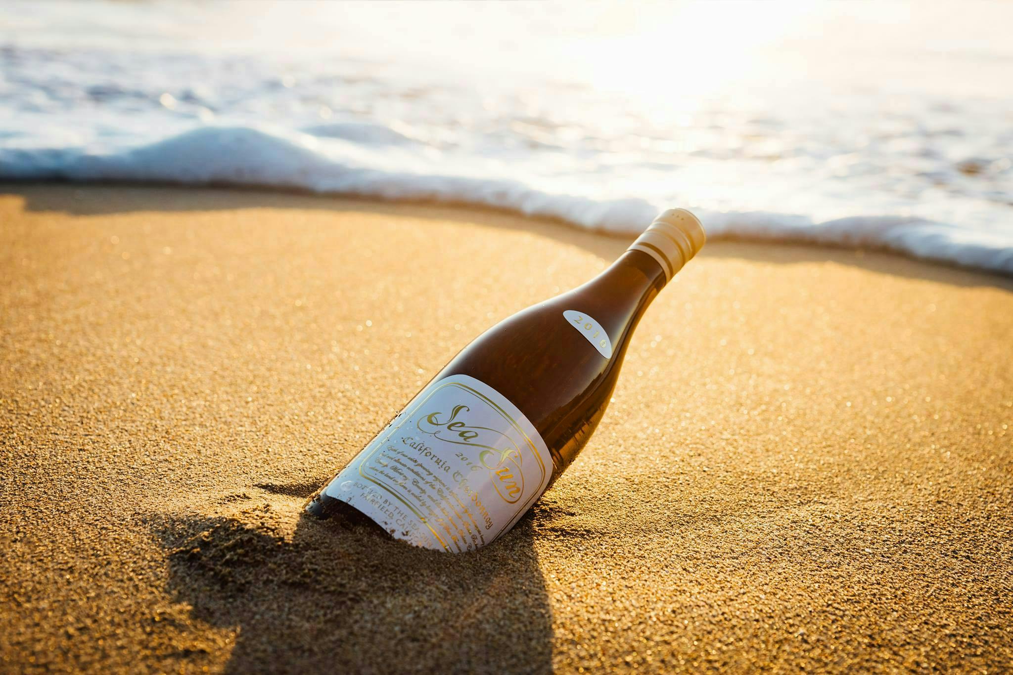 nature bottle beer alcohol beverage sand outdoors sea beer bottle shoreline