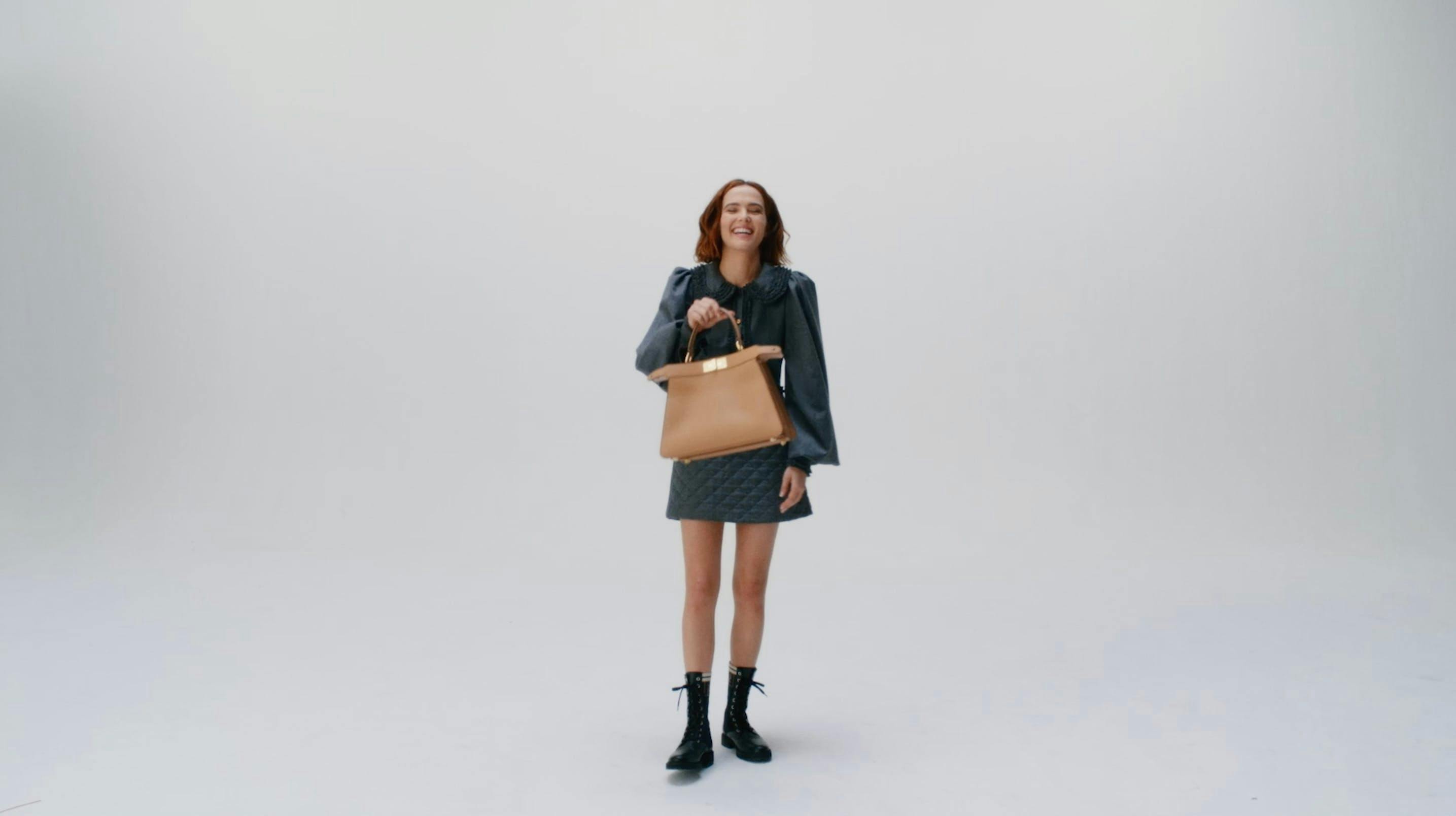 person human clothing apparel coat female bag