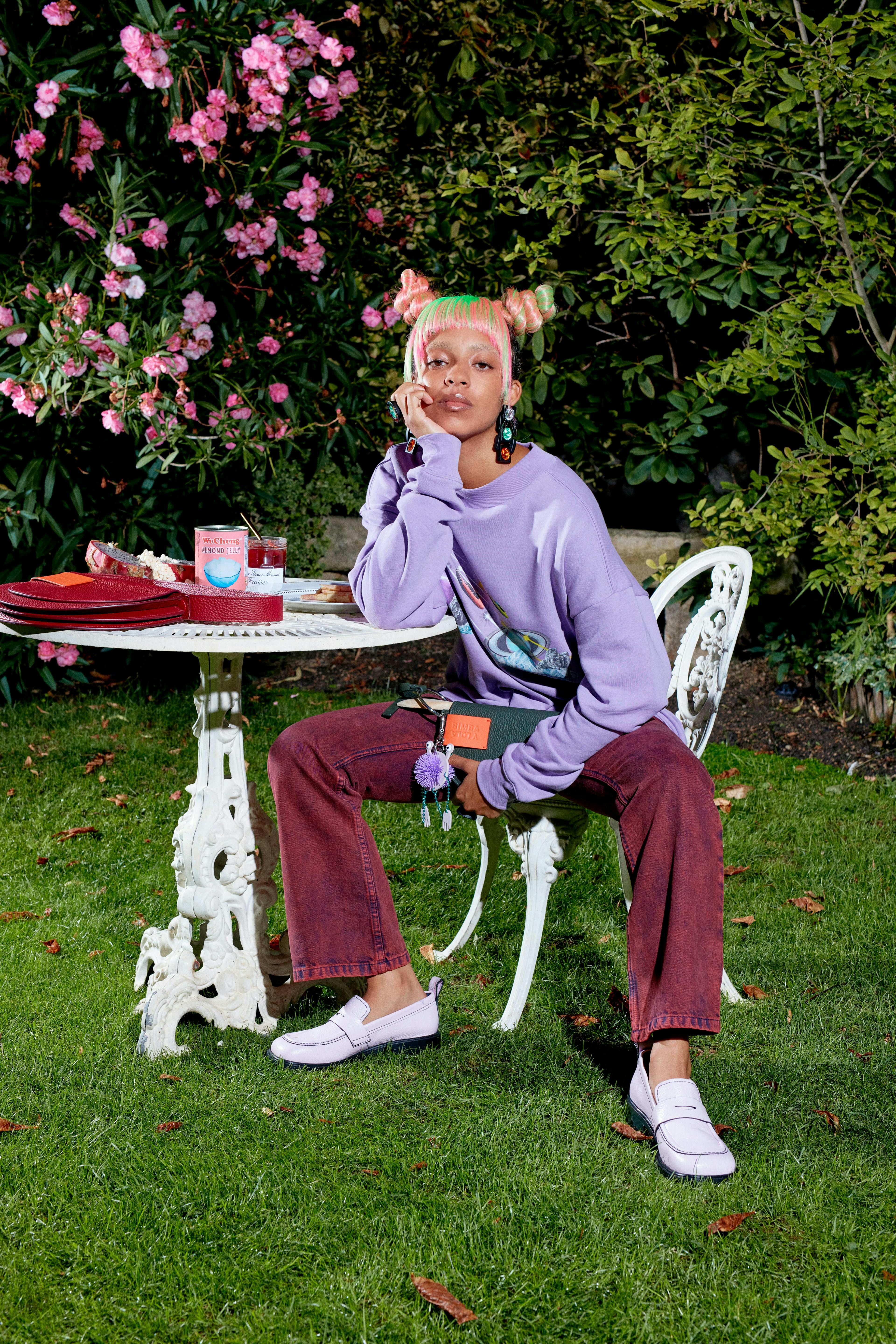 person human grass plant clothing apparel sitting meal food