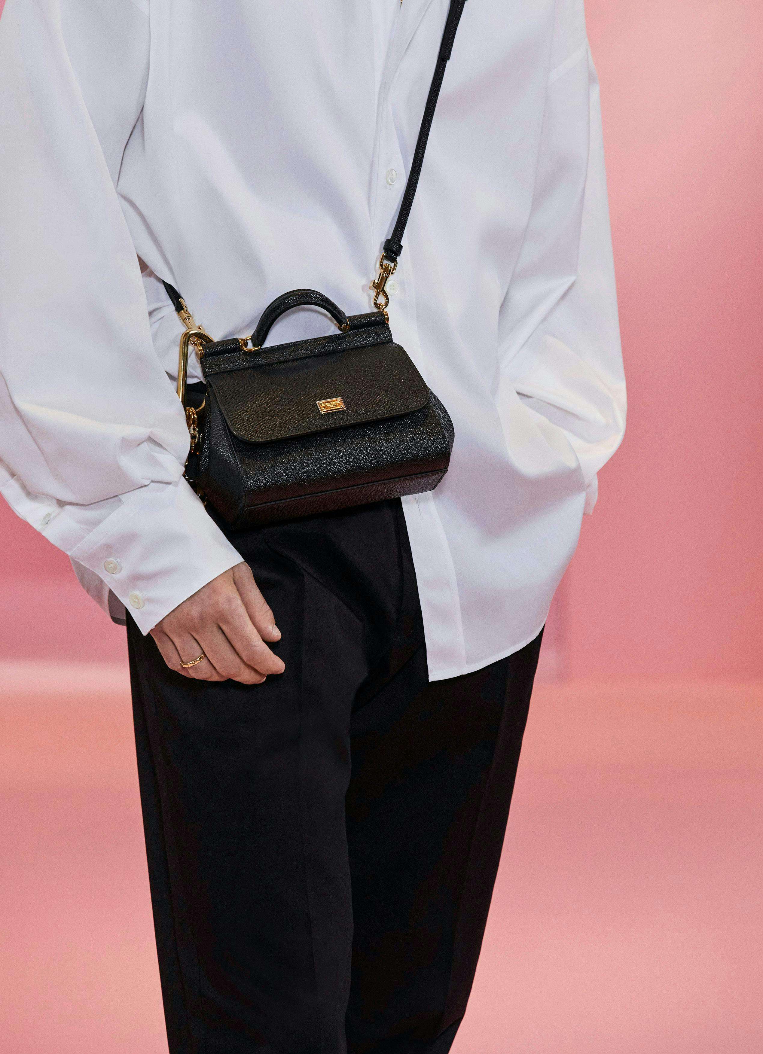 person human clothing apparel handbag accessories bag accessory sleeve