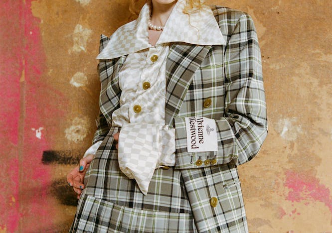 clothing apparel dress person human overcoat coat female tartan plaid