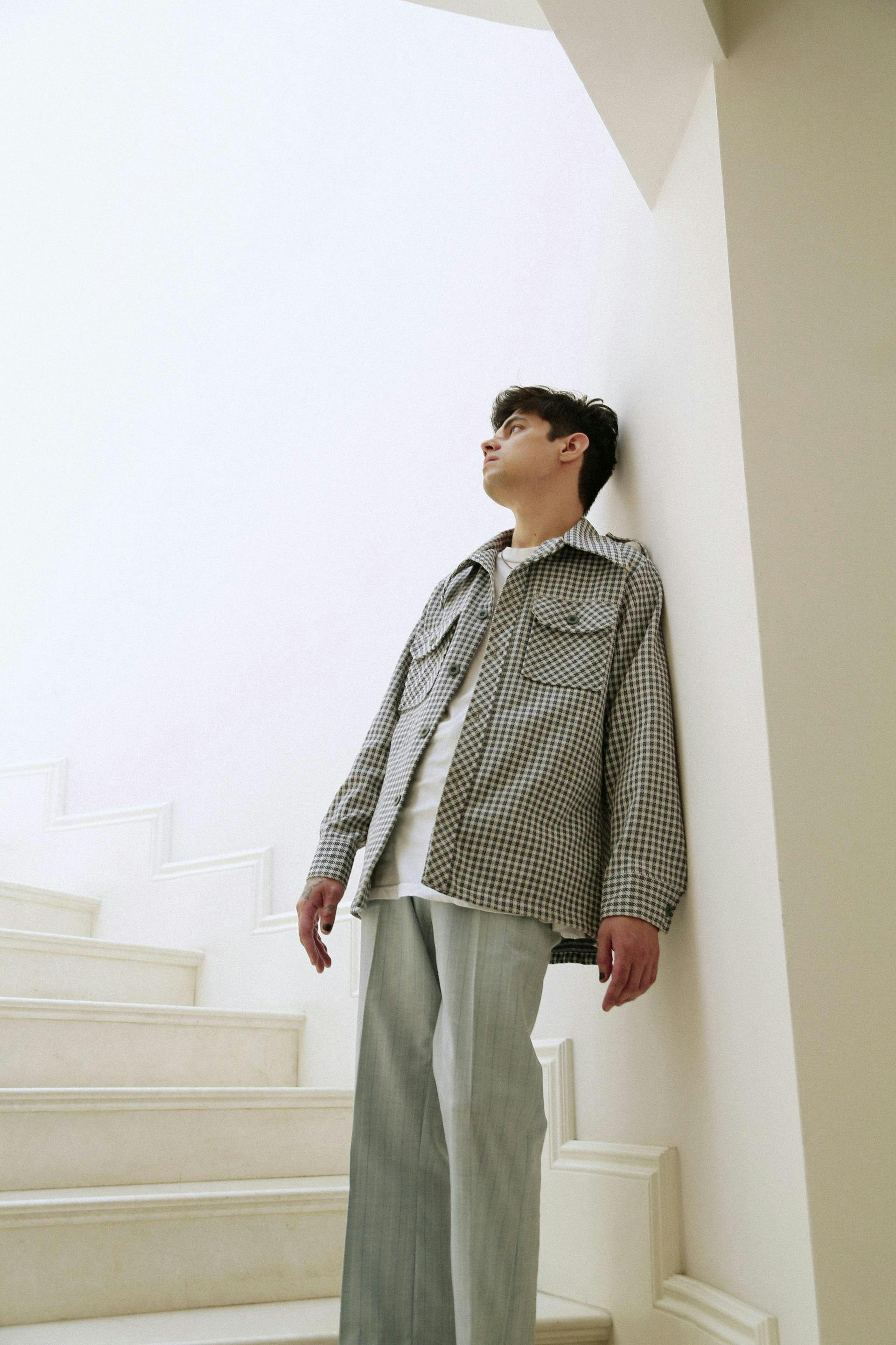 clothing apparel sleeve person human long sleeve handrail banister home decor