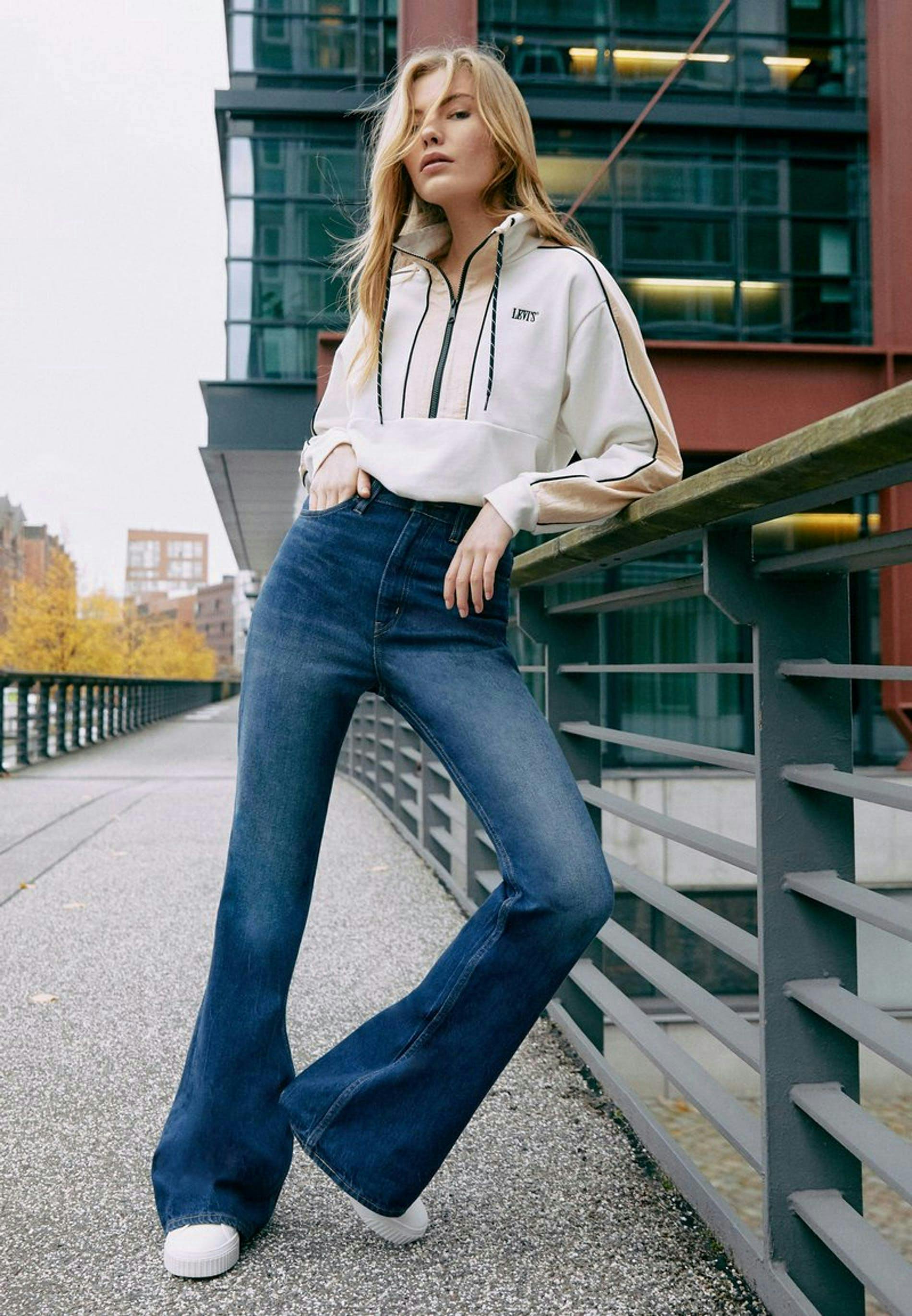 jeans denim clothing pants apparel person human sleeve female