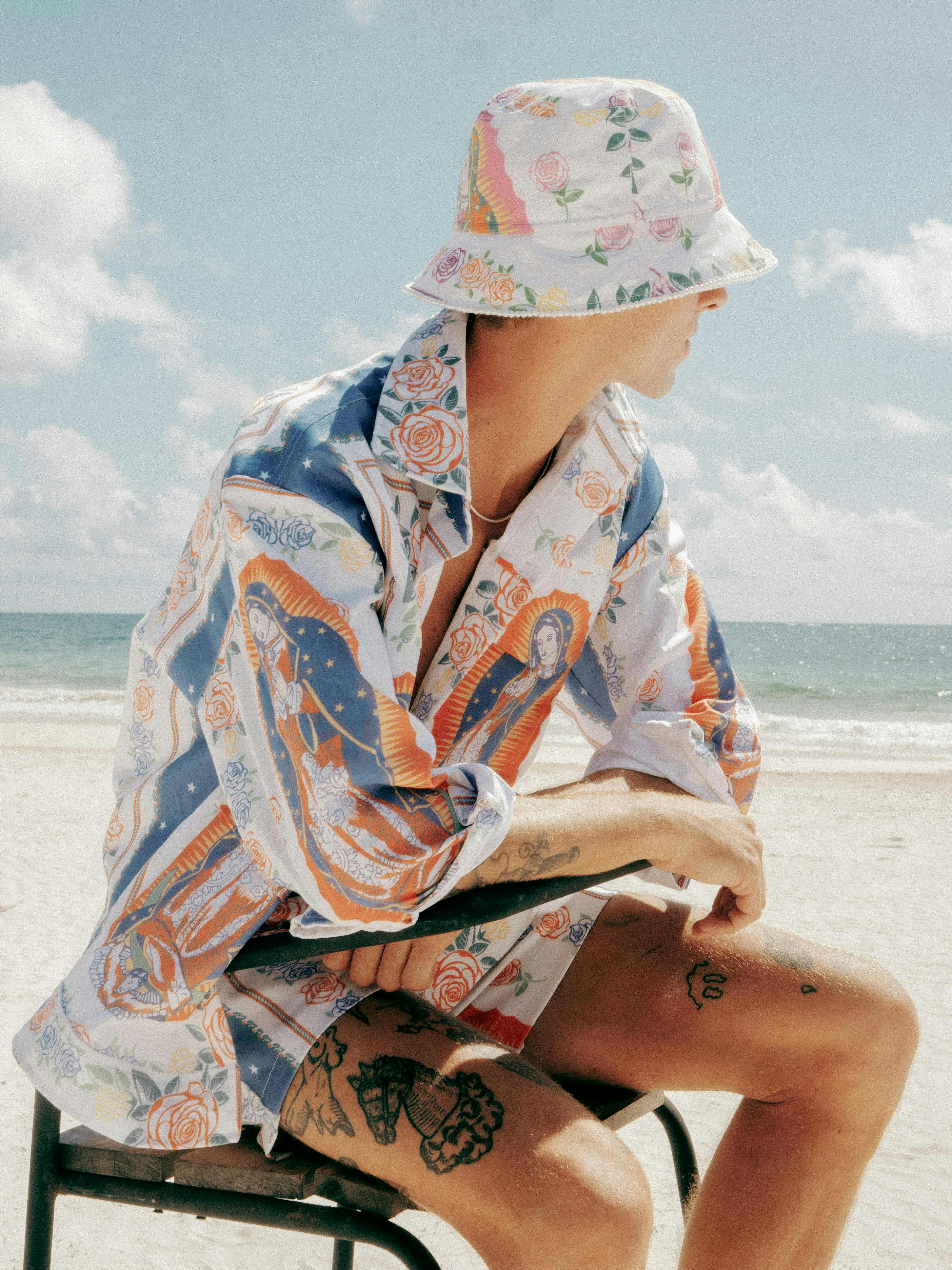 clothing apparel hat robe fashion person human sun hat gown